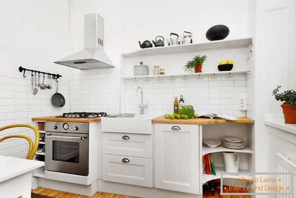 Фото необычного inнтерьера кухнin в белом цвете