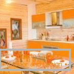 Kombinacija oranžne in lesa v kuhinji