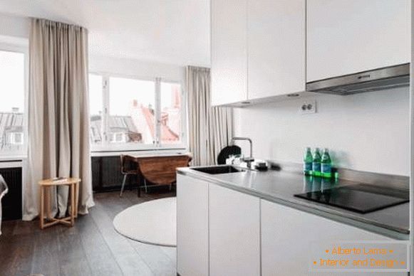 Zasnova kuhinje v majhnem studijskem stanovanju - minimalistična fotografija